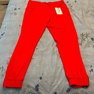 NWT ZYIA Red Everywhere zipper jogger. Size M